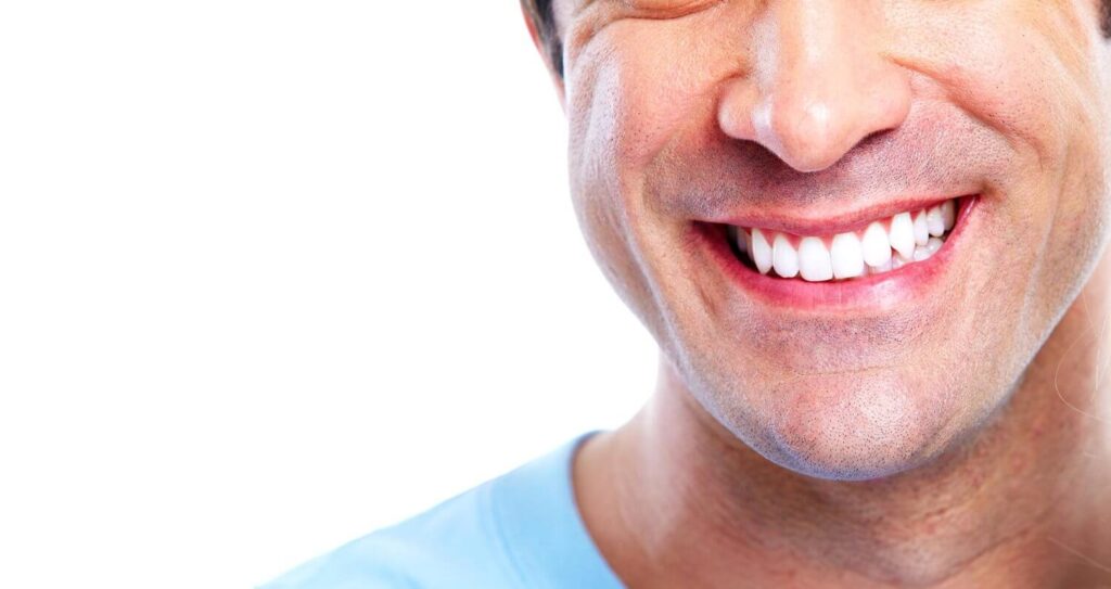 Will Teeth Whitening Damage Your Teeth Blog on Morgan Street Dental Centre - Man with Great White Teeth in Great Smile