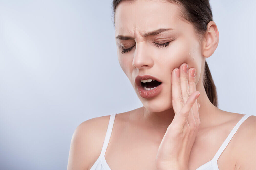 What is a Dry Socket blog on Morgan Street Dental Centre - Woman with Toothache Dental Problems