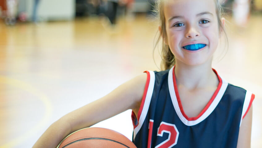 Morgan Street Dental Centre Sports Mouthguard - Sporty Beautiful Girl with Blue Mouthguard dentistwaggasportsmouthguard